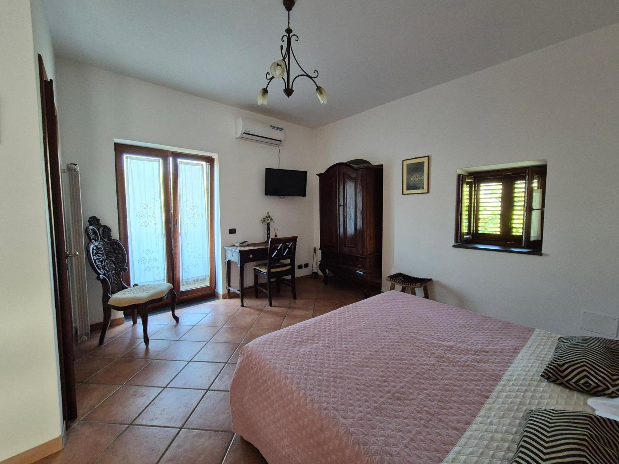 Bed and Breakfast La Cicogna Аджерола Экстерьер фото